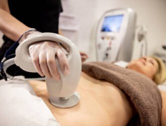 Woman at a spa getting a body treatment to tackle her problematic body fat - beauty concepts
