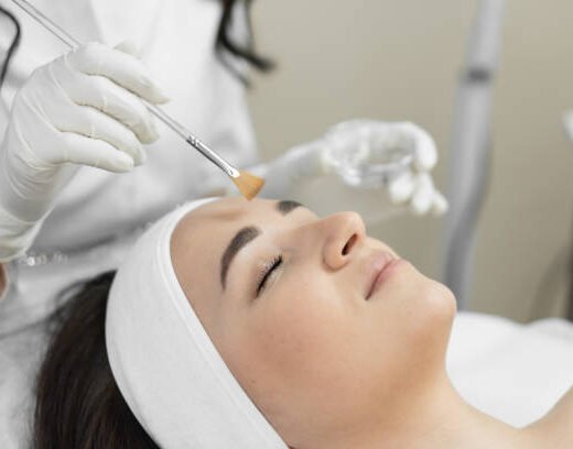 istockphoto-1495625136-612x612 In the photo, you can carefully consider the procedure of facial peeling, which helps to remove dead cells and improve the structure of the skin in a beauty clinic with a professional cosmetologist. Young beautiful woman resting. High quality photo